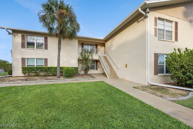 view of front of home with a front yard