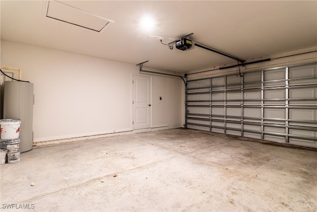 garage with a garage door opener and water heater