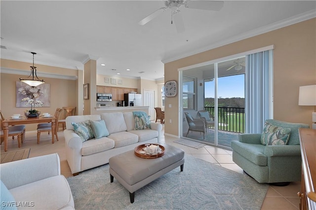 living room featuring light tile patterned flooring, ornamental molding, and ceiling fan