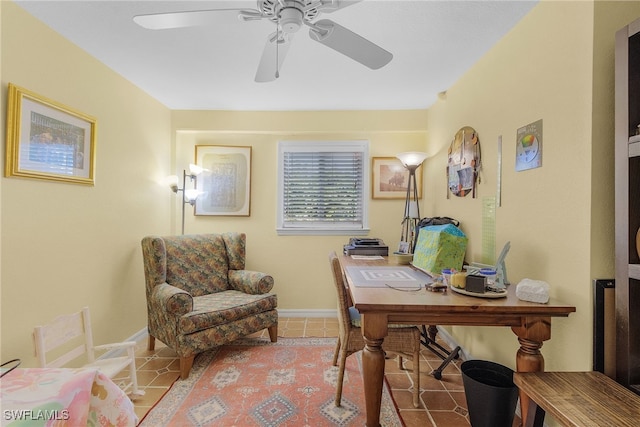 office area with tile patterned floors and ceiling fan