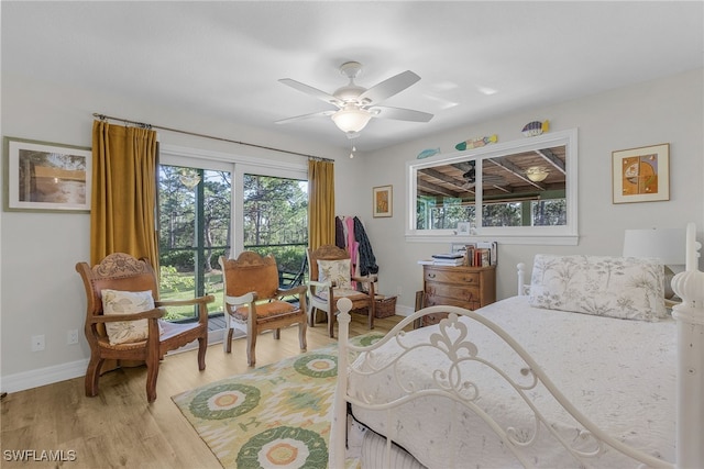 bedroom featuring ceiling fan and light hardwood / wood-style flooring