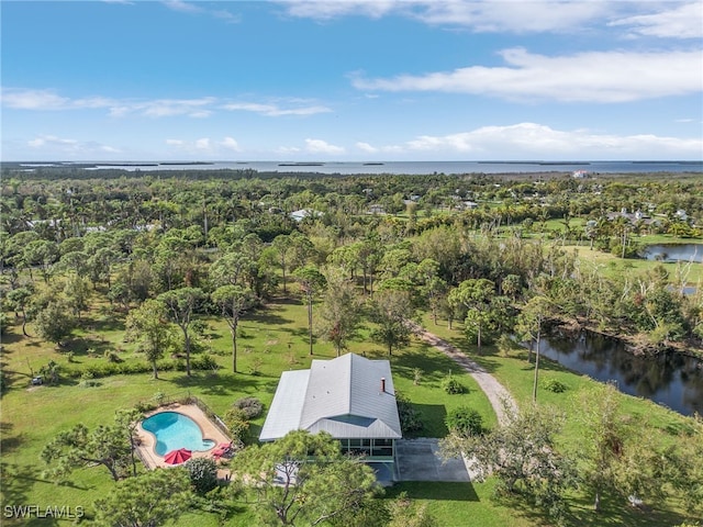 birds eye view of property featuring a water view