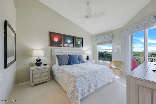 bedroom with vaulted ceiling, ceiling fan, and light colored carpet