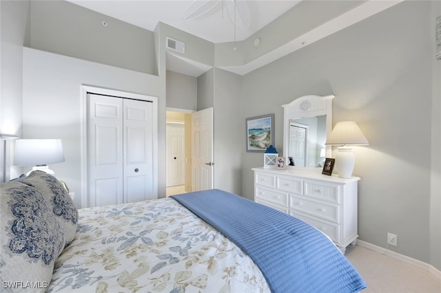 carpeted bedroom featuring ceiling fan