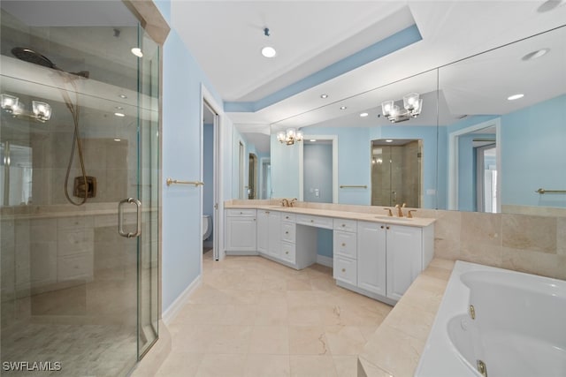 full bathroom with vanity, toilet, shower with separate bathtub, and a chandelier