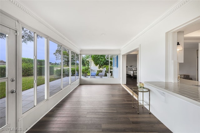 unfurnished sunroom featuring plenty of natural light