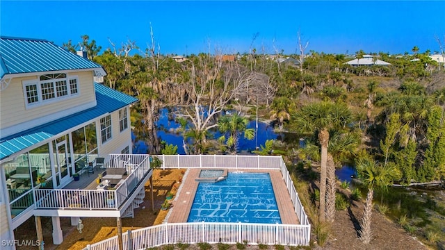 view of pool featuring a wooden deck