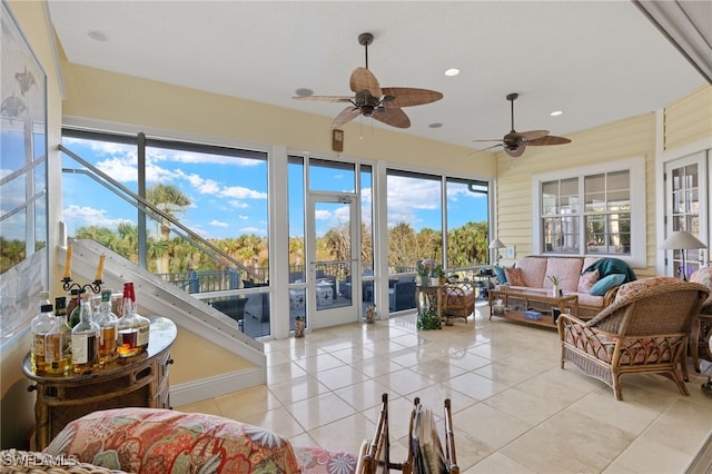 sunroom / solarium with ceiling fan