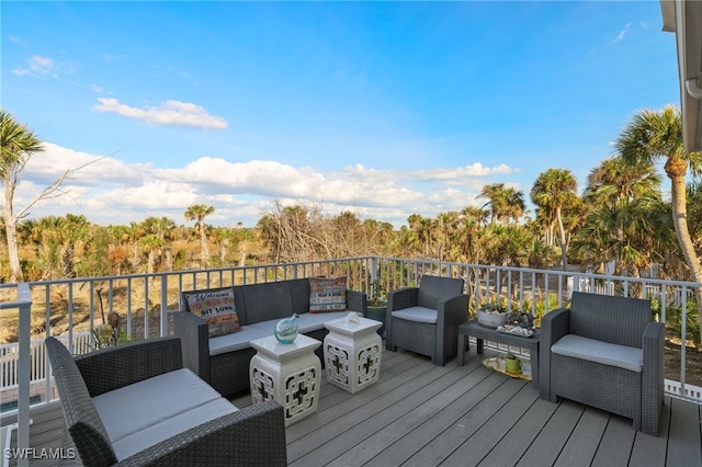 wooden deck with outdoor lounge area