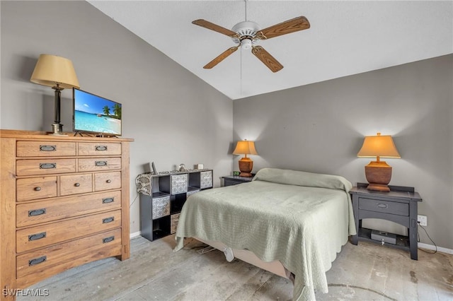 bedroom featuring light hardwood / wood-style flooring, vaulted ceiling, and ceiling fan