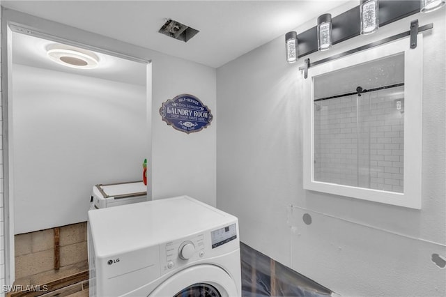 laundry area featuring washer / clothes dryer