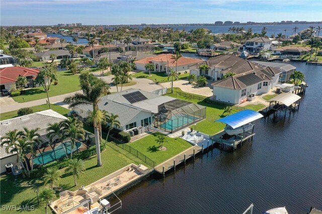 bird's eye view with a water view