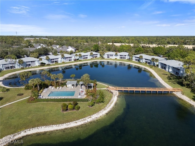 bird's eye view with a water view