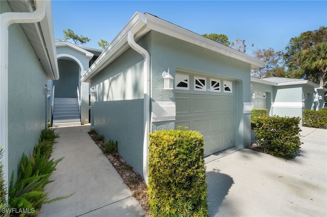 view of home's exterior with a garage