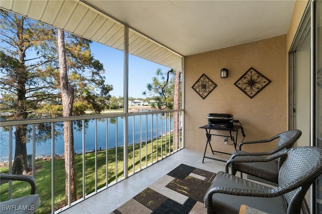 sunroom with a water view