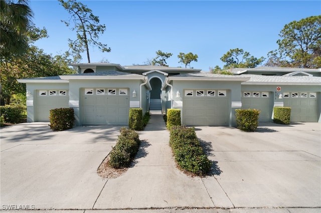 ranch-style home featuring a garage