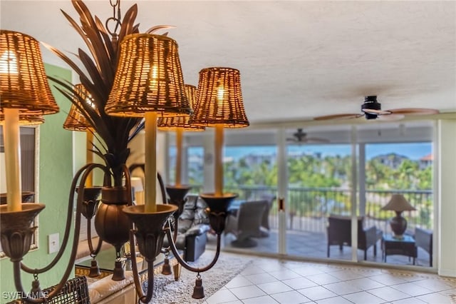 interior space featuring ceiling fan and light tile patterned flooring