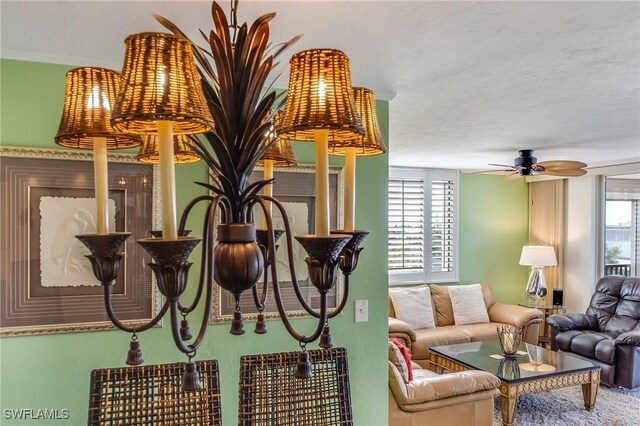 interior space featuring a textured ceiling and ceiling fan