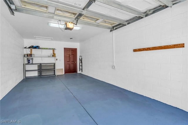 20111 Seagrove St Unit 604, Estero, FL 33928 - garage featuring concrete block wall