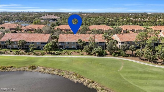 20111 Seagrove St Unit 604, Estero, FL 33928 - drone / aerial view of a golf course and a nearby body of water