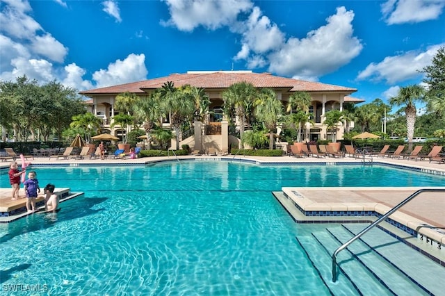 20111 Seagrove St Unit 604, Estero, FL 33928 - community pool with a patio