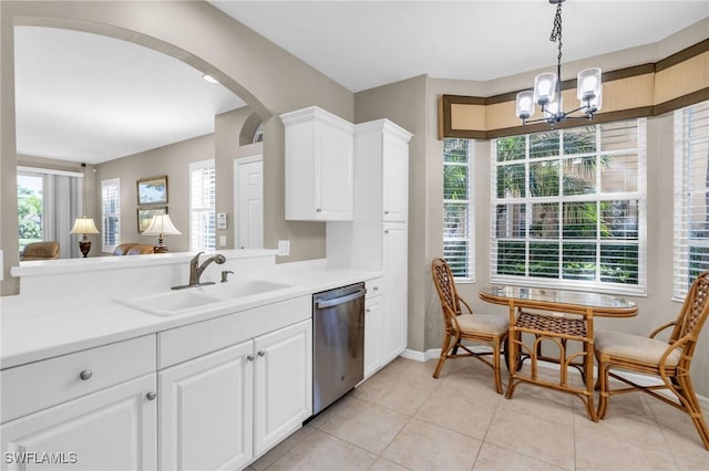 20111 Seagrove St Unit 604, Estero, FL 33928 - kitchen featuring a sink, dishwasher, a chandelier, and light countertops