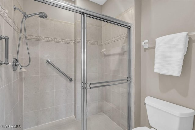 20111 Seagrove St Unit 604, Estero, FL 33928 - bathroom featuring toilet and a stall shower