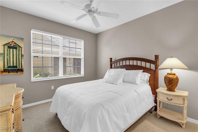20111 Seagrove St Unit 604, Estero, FL 33928 - bedroom with light colored carpet, baseboards, and ceiling fan