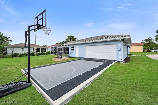 view of sport court featuring a yard