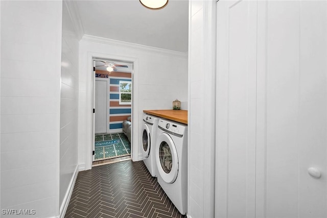 washroom featuring separate washer and dryer and ornamental molding