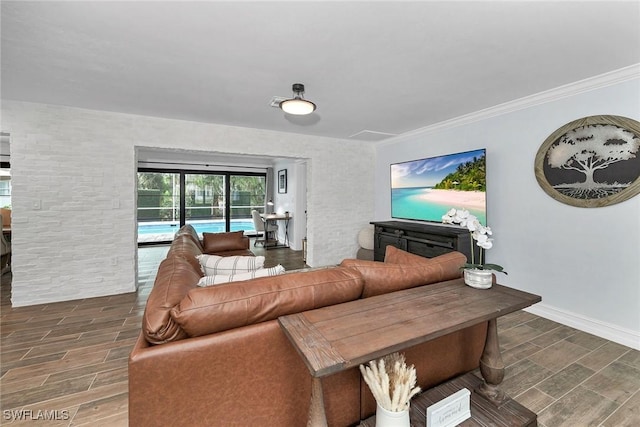 living room featuring crown molding