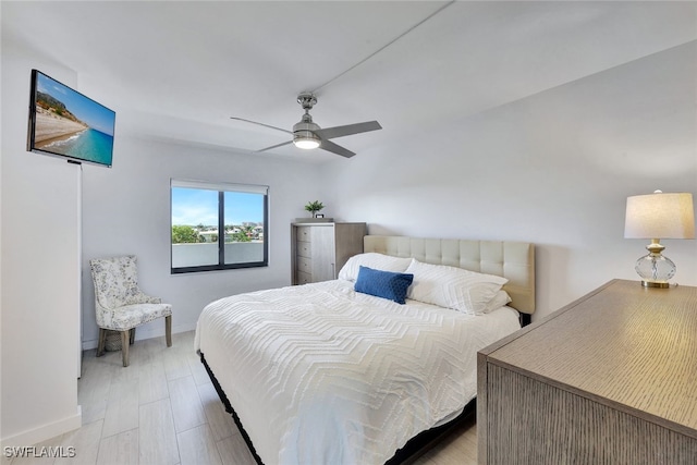 bedroom featuring light wood-type flooring and ceiling fan