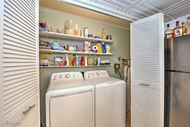 washroom featuring independent washer and dryer