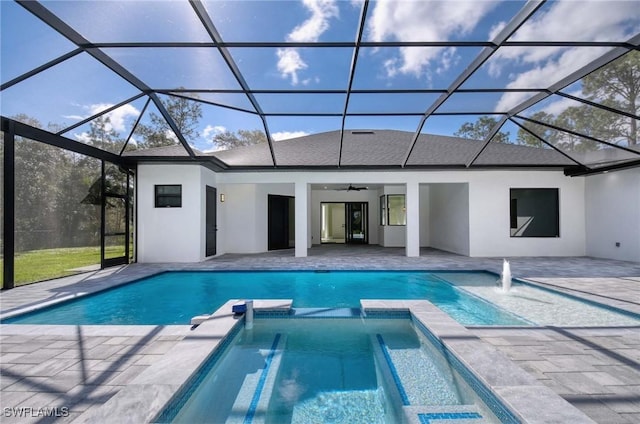 219 33rd Ave NW, Naples, FL 34120 - view of pool featuring a pool with connected hot tub, a patio, ceiling fan, and a lanai