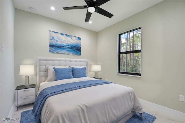 bedroom featuring ceiling fan