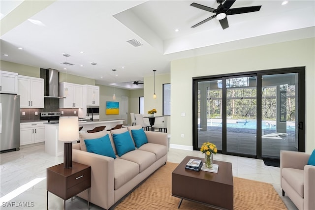 living room with ceiling fan