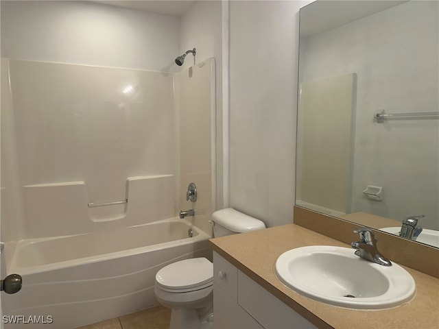 full bathroom featuring toilet, vanity, tile patterned floors, and shower / bathtub combination