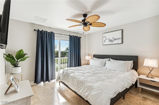 bedroom featuring ceiling fan and access to exterior