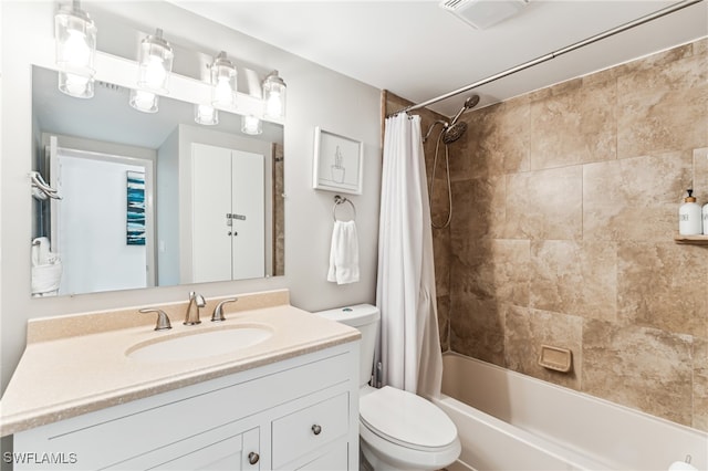 full bathroom featuring vanity, toilet, and shower / bathtub combination with curtain