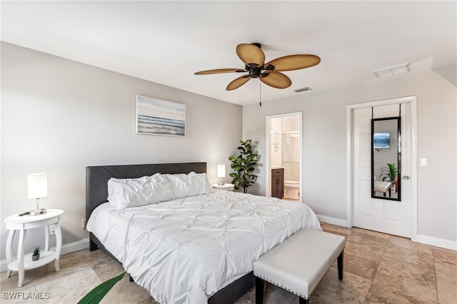 bedroom with ceiling fan and connected bathroom