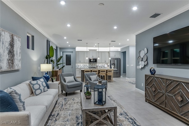 living room featuring crown molding