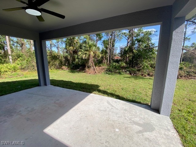 view of patio / terrace featuring ceiling fan