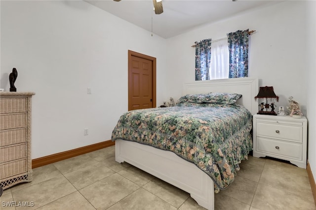 bedroom with light tile patterned flooring and ceiling fan