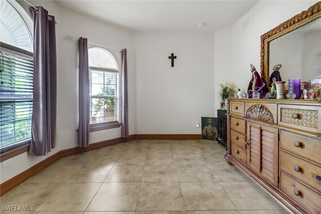 interior space featuring light tile patterned floors