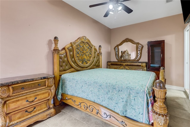 bedroom featuring ceiling fan and light tile patterned floors