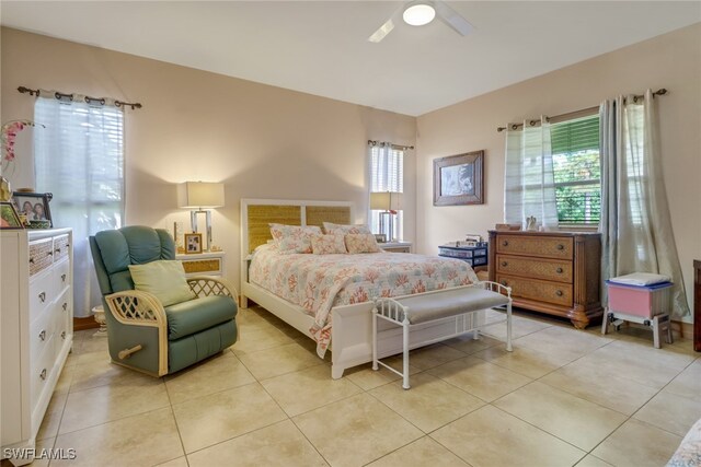 bedroom featuring ceiling fan and light tile patterned floors