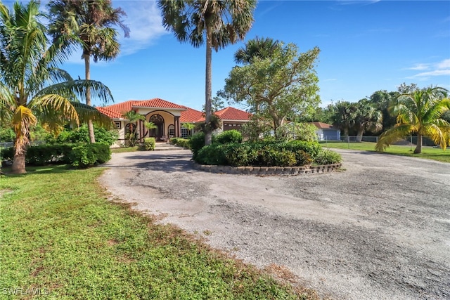 view of front of home with a front yard