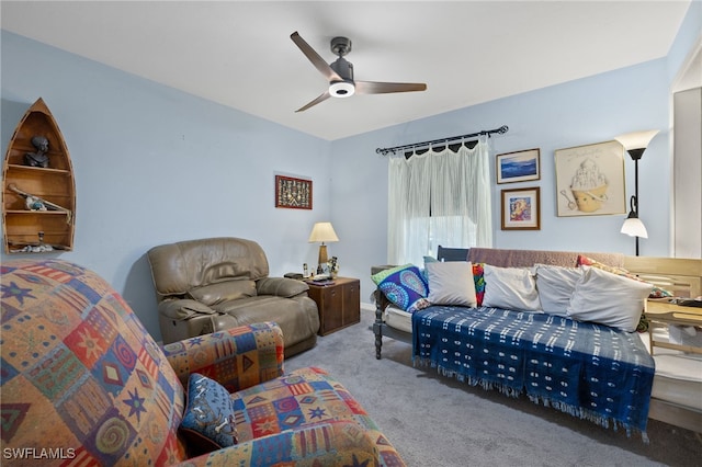 living room with light colored carpet and ceiling fan