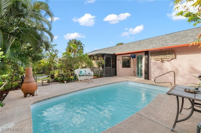 view of pool featuring a patio area