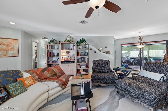 living room with ceiling fan